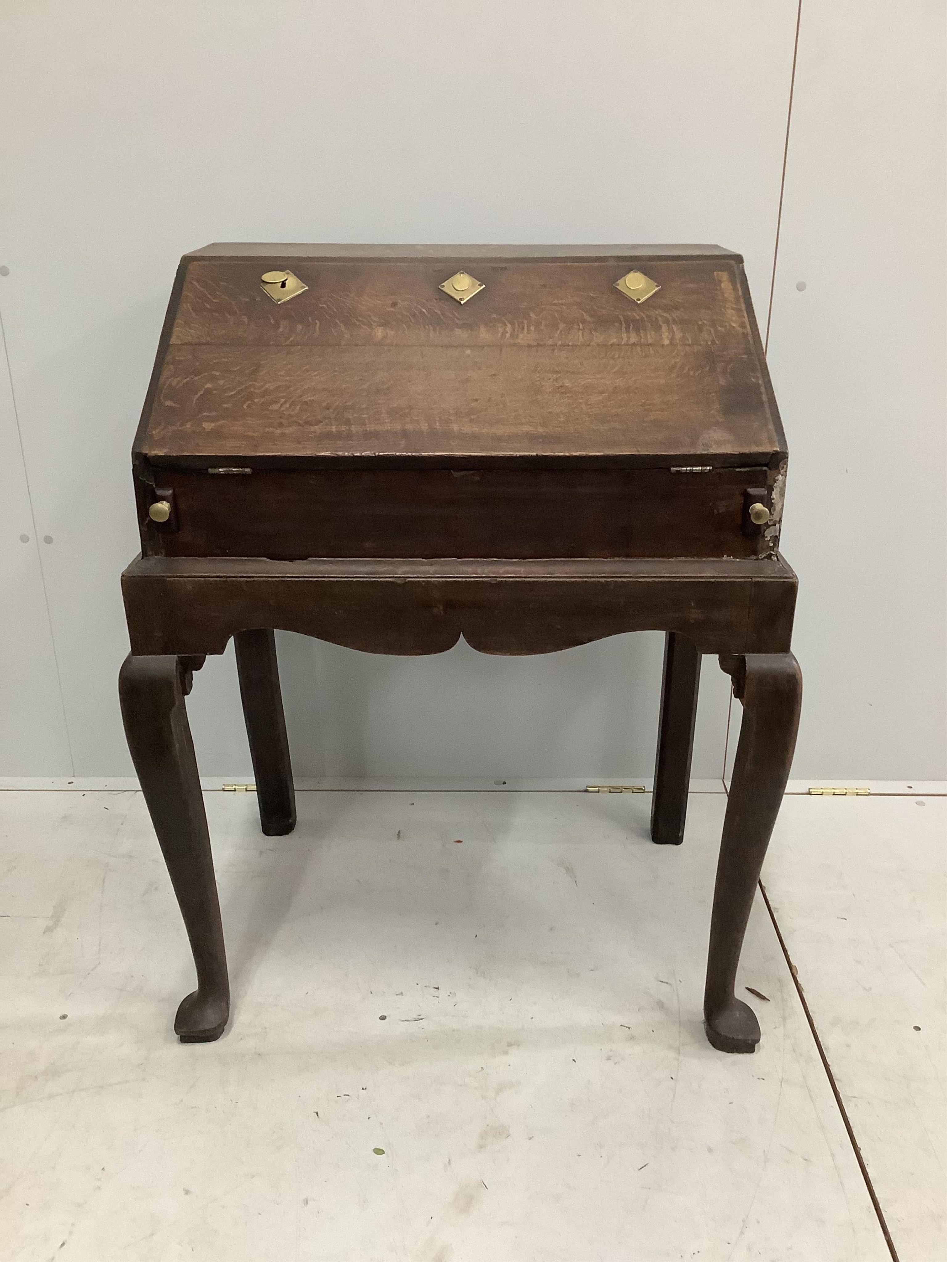 A late 18th century oak bureau on stand, width 78cm, depth 54cm, height 97cm. Condition - fair